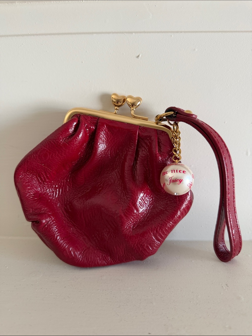 Juicy Couture Burgundy Patent Wristlet with Gold Heart Kiss Lock